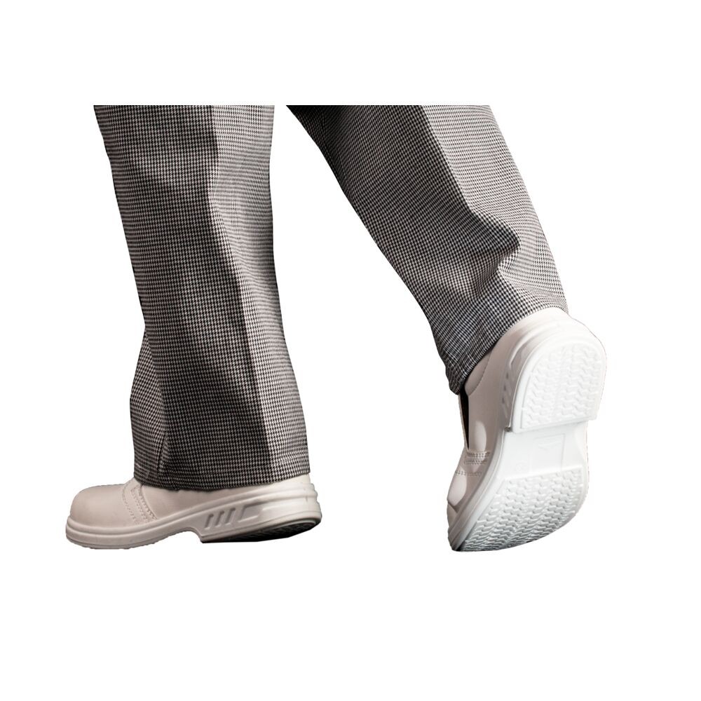 A white workwear garment designed for use on construction sites and in industrial work environments.,