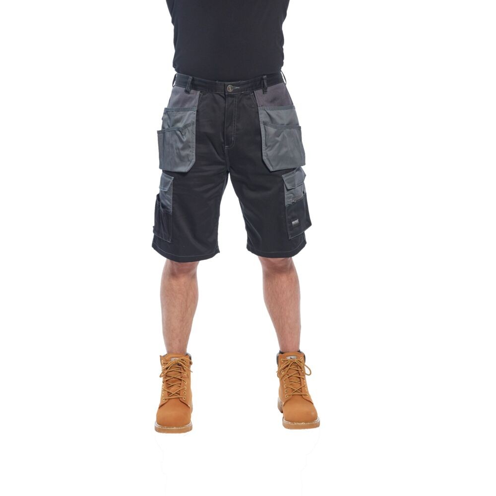 A black workwear garment designed for use on construction sites and in industrial work environments.,