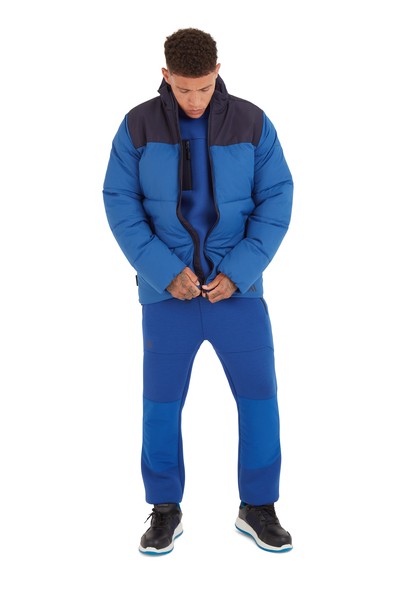 A navy blue padded jacket featuring a warm thermal lining, suitable for a wide range of outdoor and site work applications.