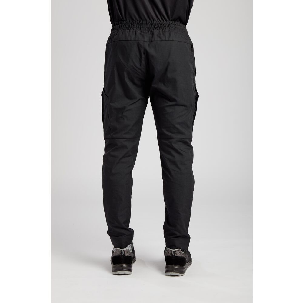 A pair of black work trousers designed for use on construction sites and in industrial work environments.,