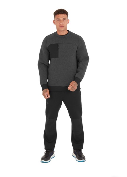 A grey work shirt designed for use on construction sites and in industrial work environments.,