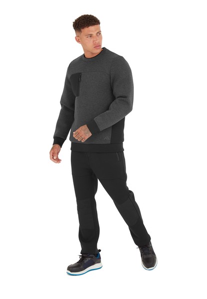 A grey work shirt designed for use on construction sites and in industrial work environments.,