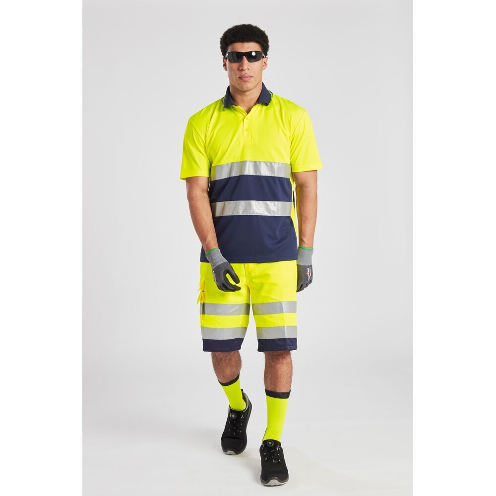A high-visibility yellow workwear garment featuring retroreflective tape panels, suitable for a wide range of outdoor and site work applications.