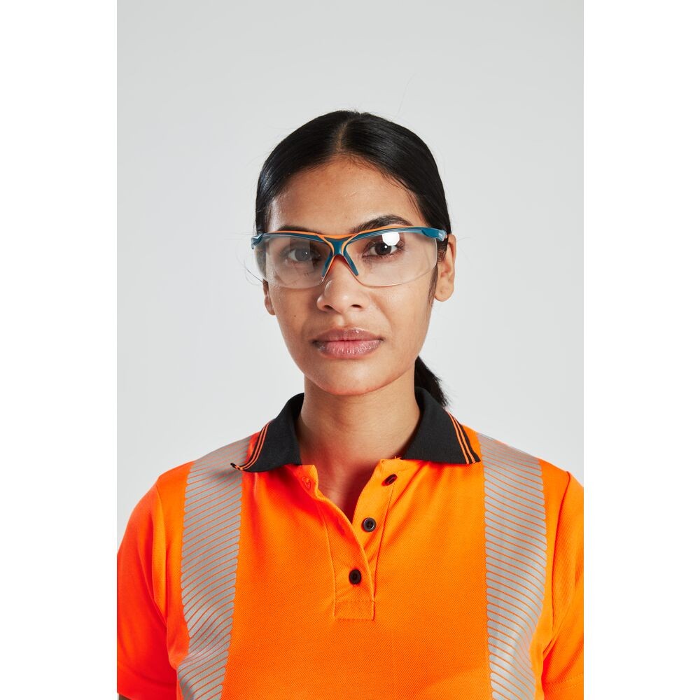A women's high-visibility orange polo shirt featuring retroreflective tape panels, suitable for a wide range of outdoor and site work applications.