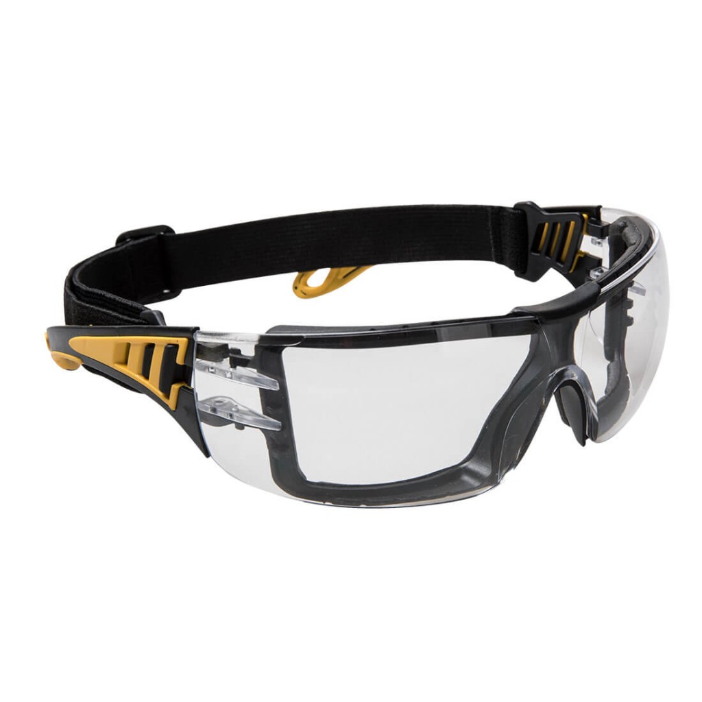 A pair of safety spectacles with clear impact-resistant lenses and adjustable side arms, for eye protection during site work.