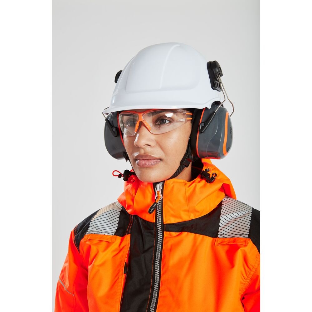 A pair of safety spectacles with clear impact-resistant lenses and adjustable side arms, for eye protection during site work.