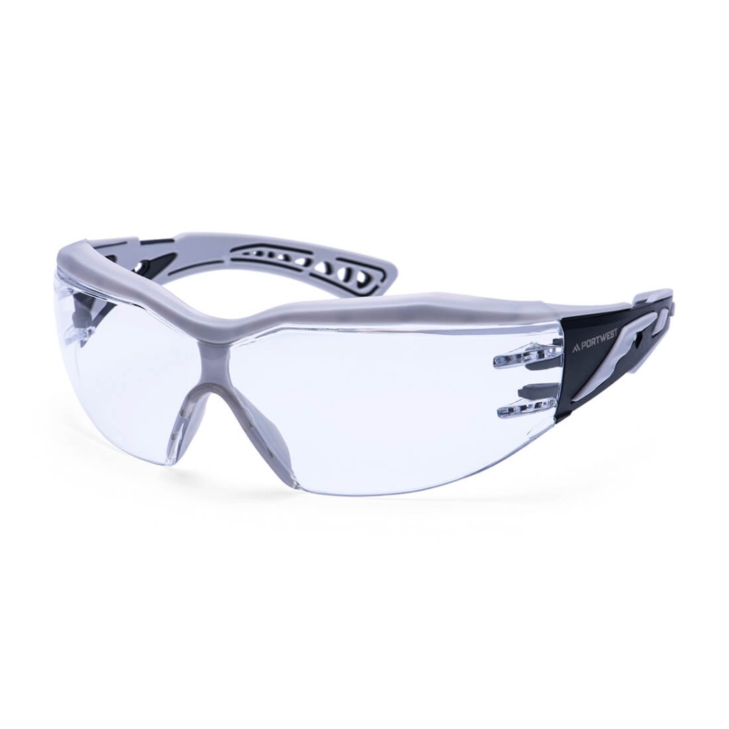 A pair of safety spectacles with clear impact-resistant lenses and adjustable side arms, for eye protection during site work.
