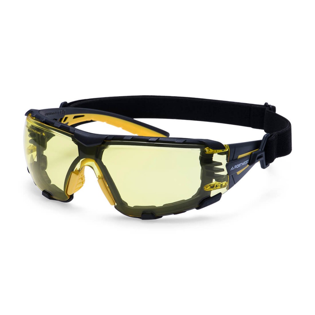 A pair of safety spectacles with clear impact-resistant lenses and adjustable side arms, for eye protection during site work.