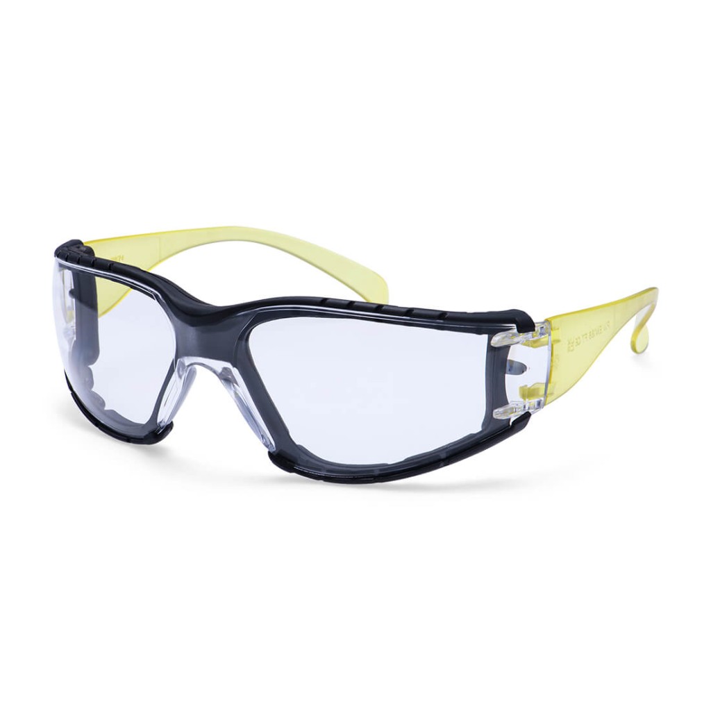 A pair of safety spectacles with clear impact-resistant lenses and adjustable side arms, for eye protection during site work.