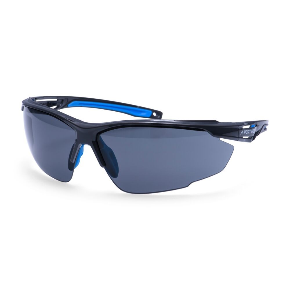A pair of safety spectacles with clear impact-resistant lenses and adjustable side arms, for eye protection during site work.