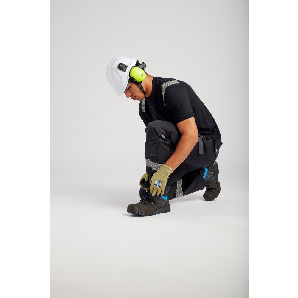 A moulded disposable dust mask with a nose clip and elasticated headbands, designed to filter airborne particulates during dusty work.