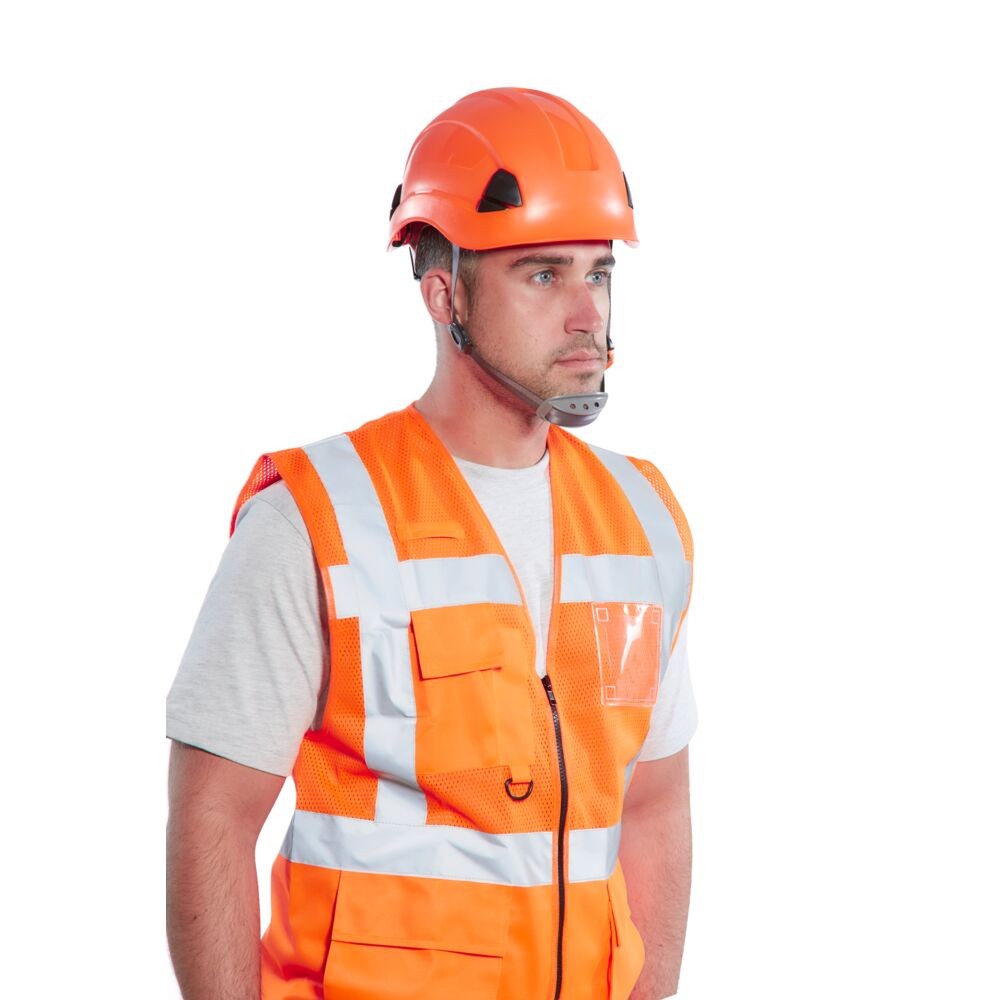 A orange safety helmet with an adjustable suspension harness and ventilation slots, providing impact protection on construction sites.