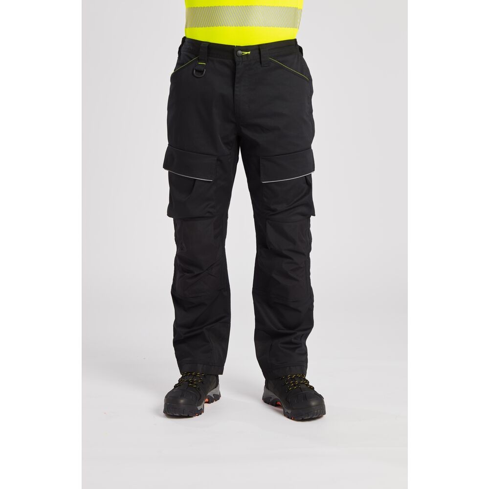 A pair of black work trousers designed for use on construction sites and in industrial work environments.,
