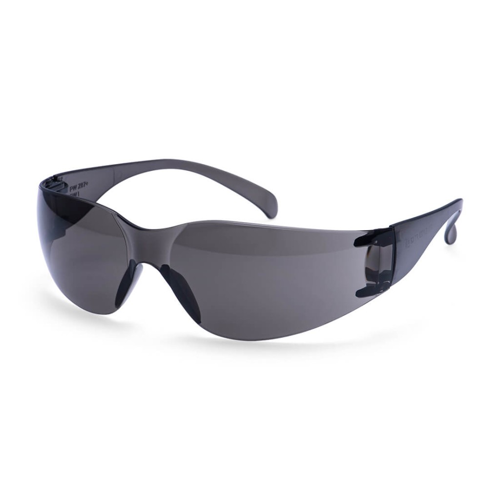 A pair of safety spectacles with black impact-resistant lenses and adjustable side arms, for eye protection during site work.