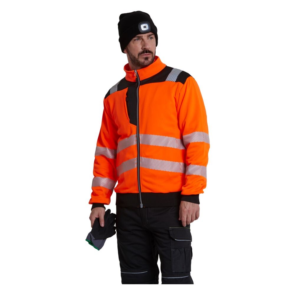 A high-visibility orange work shirt featuring retroreflective tape panels, a full-length zip front, suitable for a wide range of outdoor and site work applications.