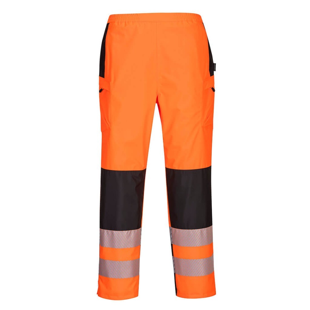 A pair of women's high-visibility orange trousers featuring retroreflective tape panels, suitable for a wide range of outdoor and site work applications.