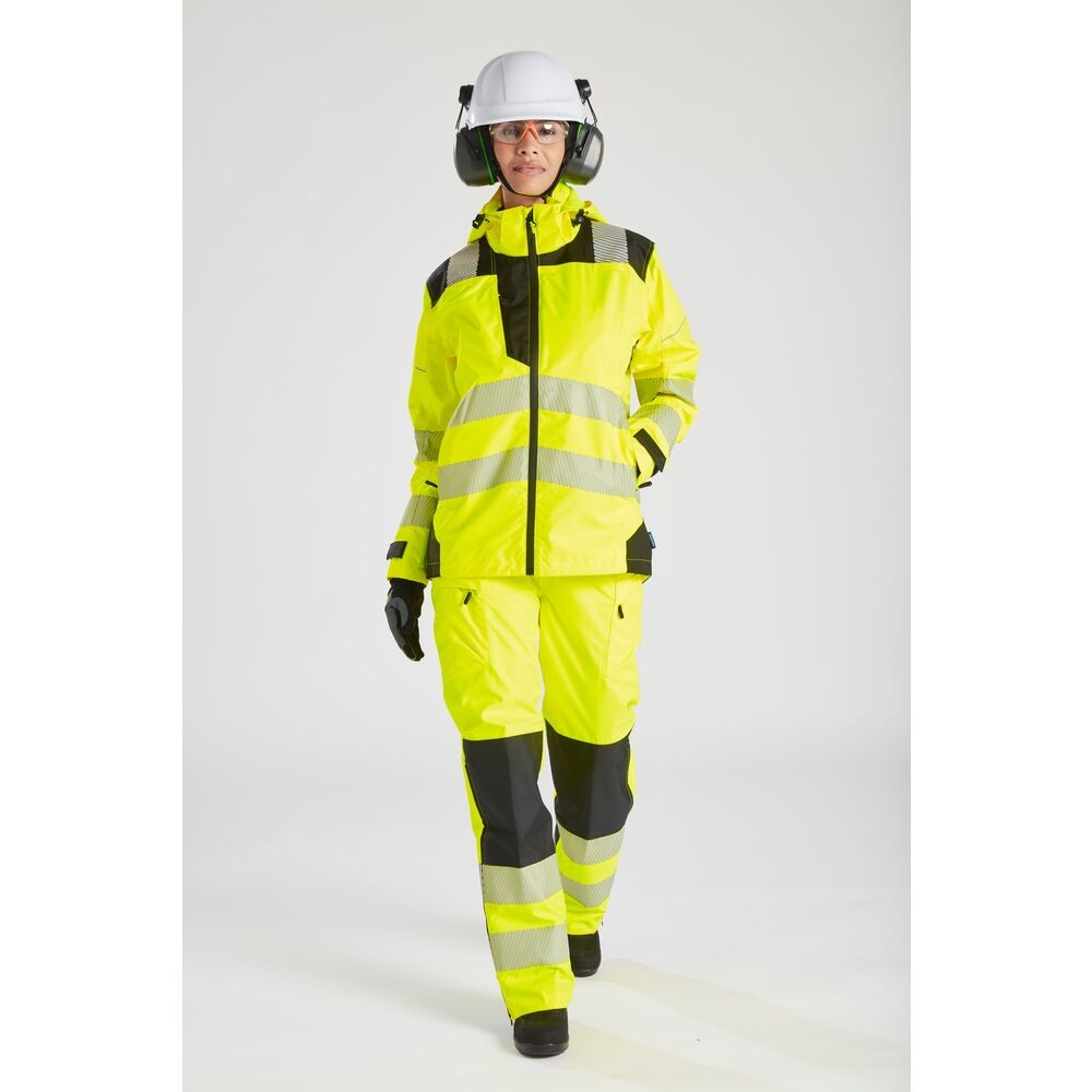 A pair of women's high-visibility yellow trousers featuring retroreflective tape panels, suitable for a wide range of outdoor and site work applications.
