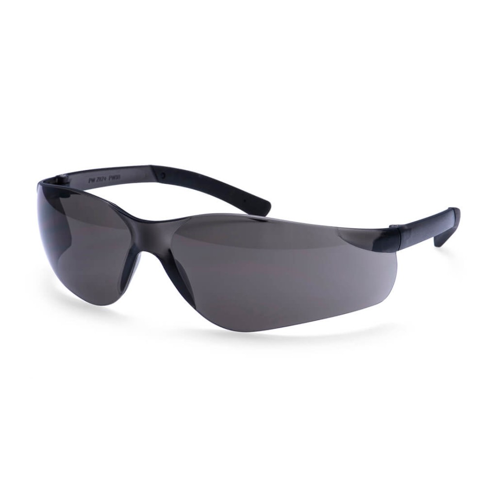 A pair of safety spectacles with black impact-resistant lenses and adjustable side arms, for eye protection during site work.