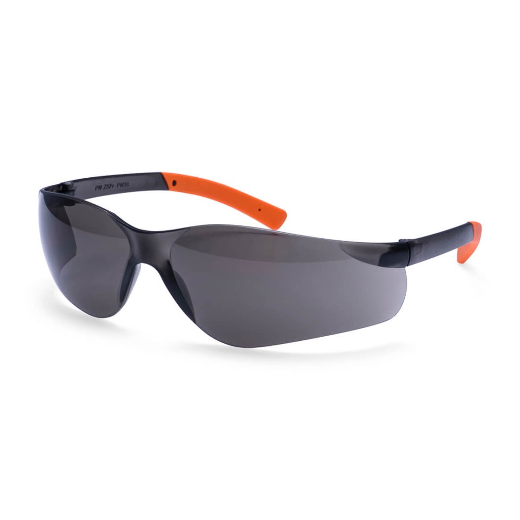 A pair of safety spectacles with orange impact-resistant lenses and adjustable side arms, for eye protection during site work.