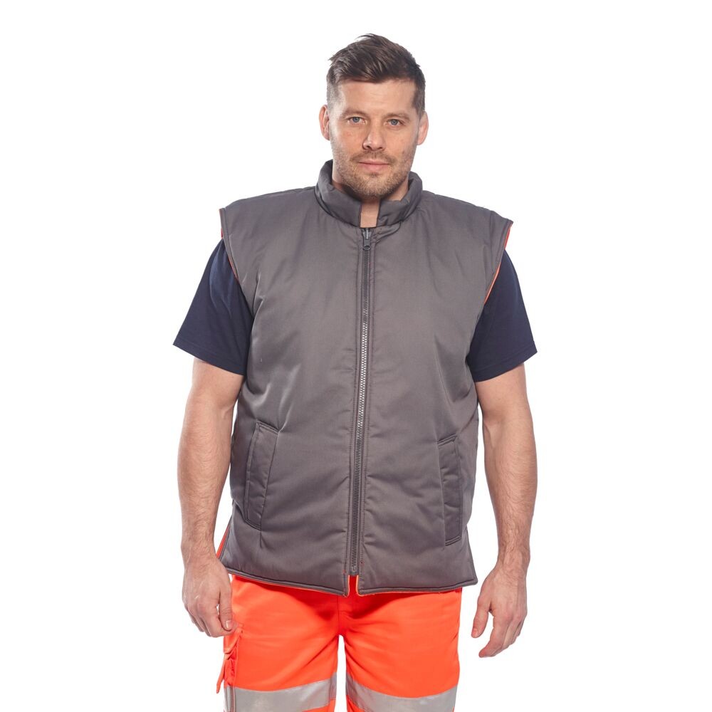 A high-visibility orange workwear garment featuring retroreflective tape panels, suitable for a wide range of outdoor and site work applications.