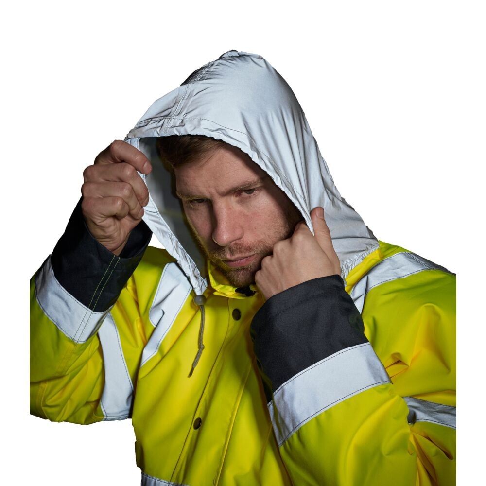 A high-visibility yellow jacket featuring retroreflective tape panels, suitable for a wide range of outdoor and site work applications.