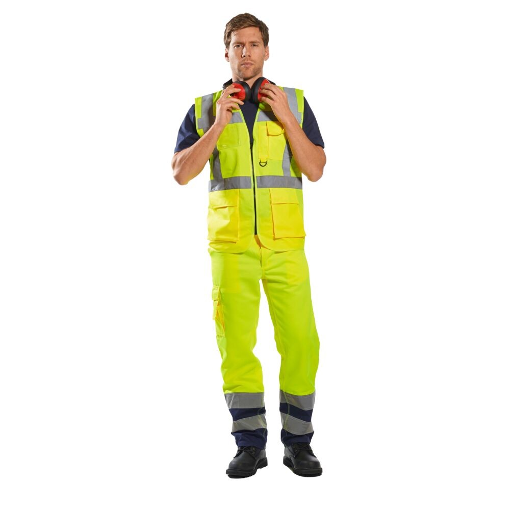 A high-visibility yellow vest featuring retroreflective tape panels, suitable for a wide range of outdoor and site work applications.