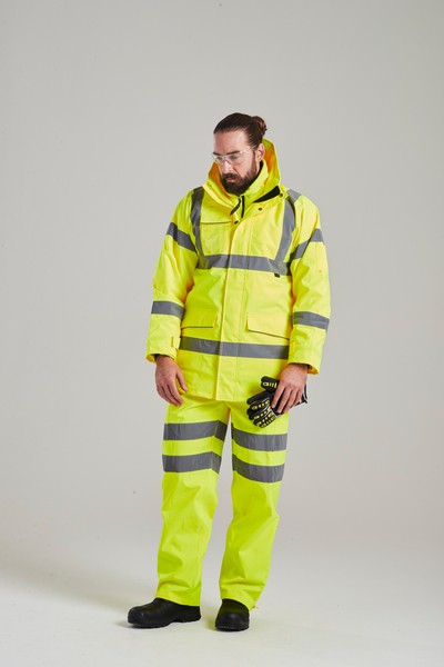 A high-visibility yellow waterproof jacket featuring retroreflective tape panels, suitable for a wide range of outdoor and site work applications.