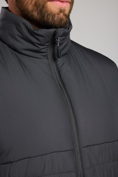 A grey safety vest featuring a warm thermal lining, suitable for a wide range of outdoor and site work applications.