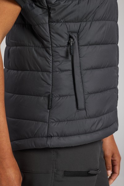 A women's grey safety vest featuring a warm thermal lining, suitable for a wide range of outdoor and site work applications.