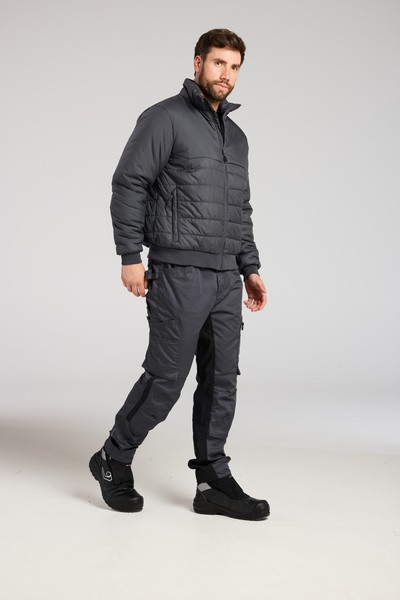 A grey padded jacket featuring a warm thermal lining, suitable for a wide range of outdoor and site work applications.