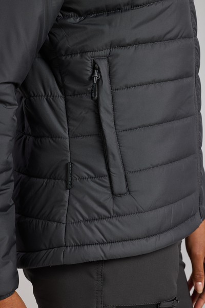 A women's grey padded jacket featuring a warm thermal lining, suitable for a wide range of outdoor and site work applications.