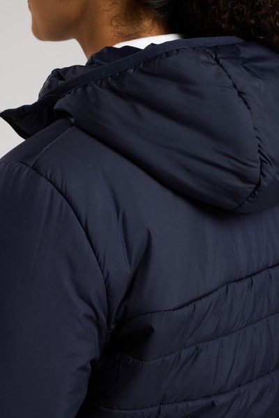 A women's navy blue padded jacket featuring a warm thermal lining, suitable for a wide range of outdoor and site work applications.