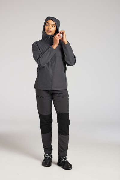 A women's grey waterproof jacket designed for use on construction sites and in industrial work environments.,