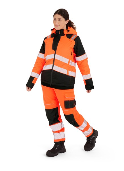 A women's high-visibility orange jacket featuring retroreflective tape panels, suitable for a wide range of outdoor and site work applications.