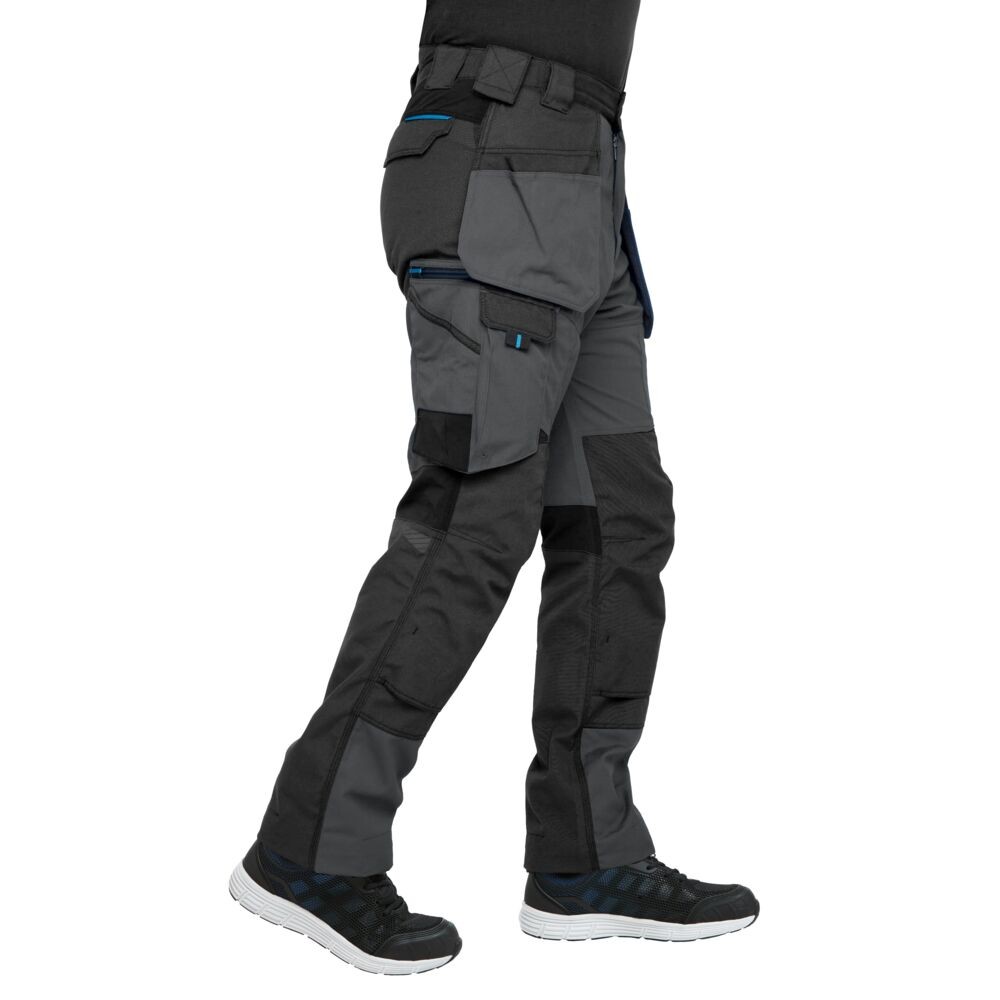 A pair of grey work trousers designed for use on construction sites and in industrial work environments.,