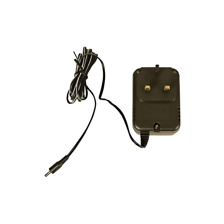 A black plug-in power adapter with a UK-style three-pin plug and an attached cable ending in a barrel connector, placed on a white background.