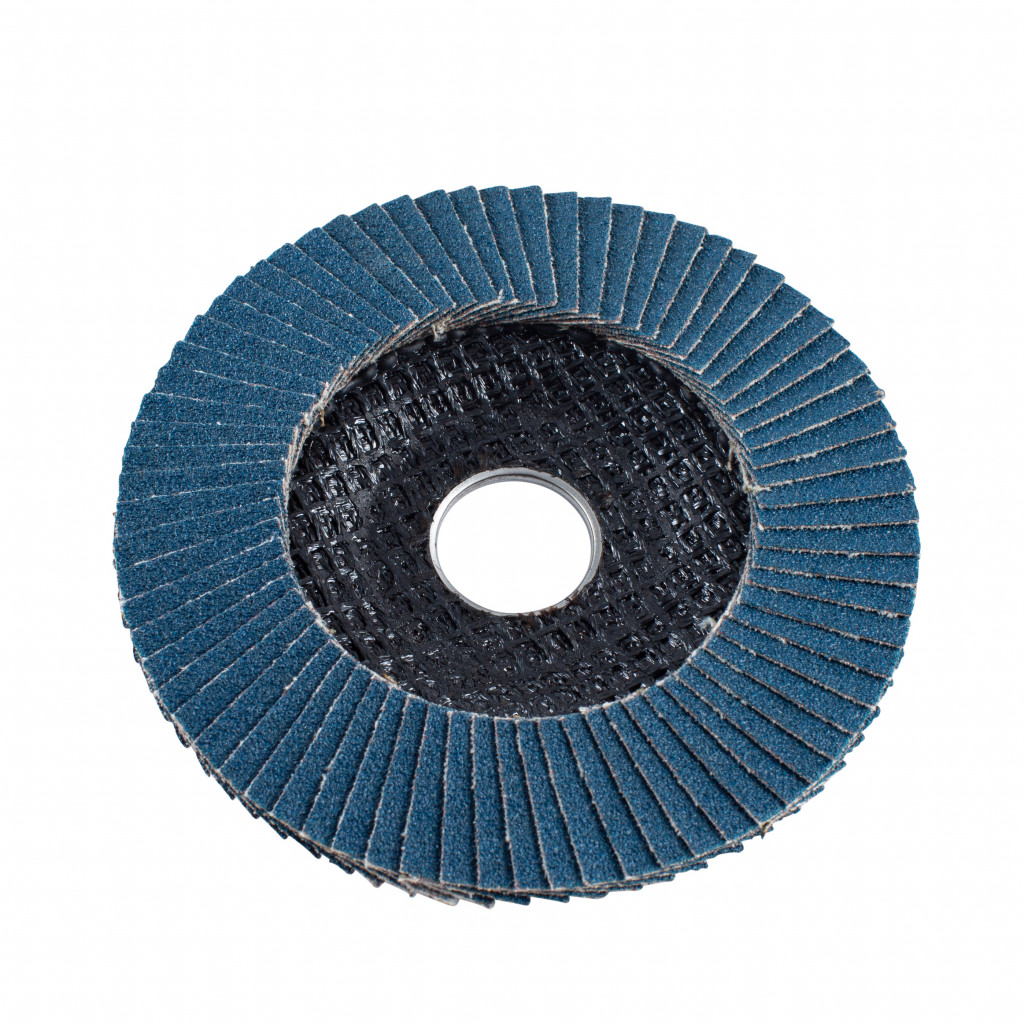 A close-up of a blue abrasive flap disc with a central hole, used for grinding and finishing metal surfaces. The disc has multiple overlapping sandpaper flaps arranged in a circular pattern.