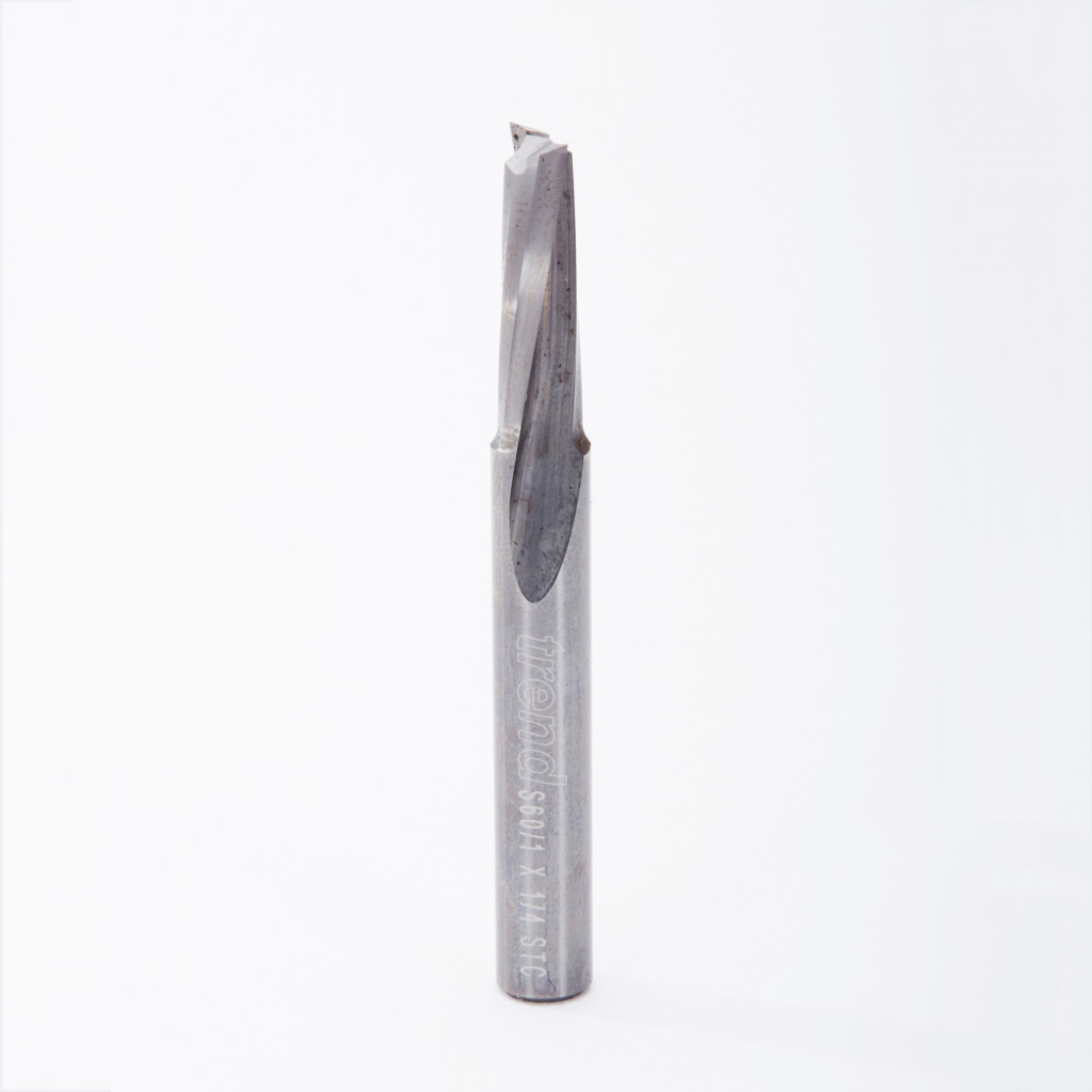 A close-up of a single metal drill bit or cutting tool standing upright on a plain white background. The tool has engraved markings along the shaft.,