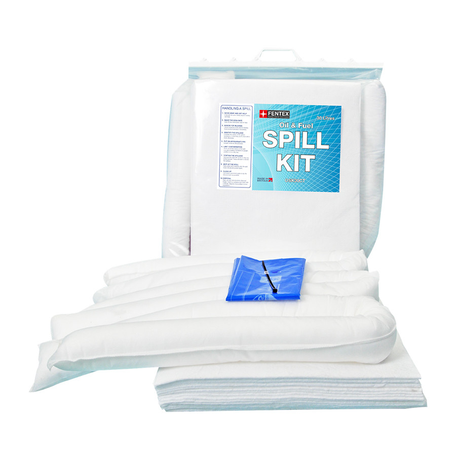 A white spill kit with absorbent pads, socks, and a blue disposal bag is displayed in front of a clear plastic carrying case labeled Oil & Fuel Spill Kit.