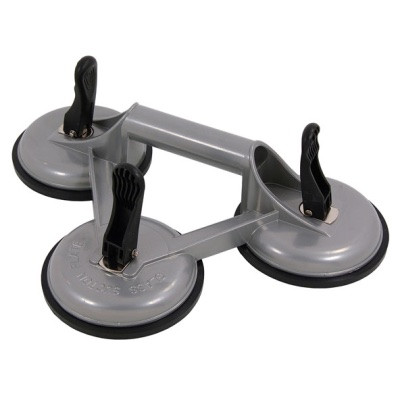 A triple suction cup lifter with three circular suction pads connected by a gray handle and three black levers for securing the suction.,