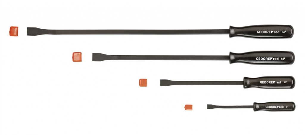 Four flathead screwdrivers of varying lengths and sizes are laid out horizontally with their corresponding orange caps placed separately beside each tool. The handles are labeled GEDORE red.,