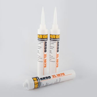 Three tubes of ARBO XL1075 sealant are shown, two standing upright with nozzles attached and one lying down in front without a nozzle, against a plain light background.