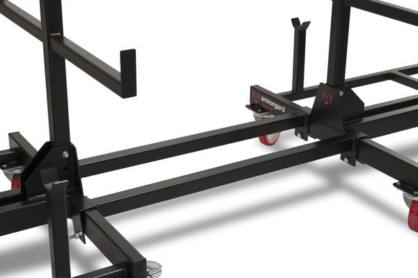 A steel metal shelving unit with adjustable shelf heights and a robust welded steel frame, for organised storage in workshops and site cabins.