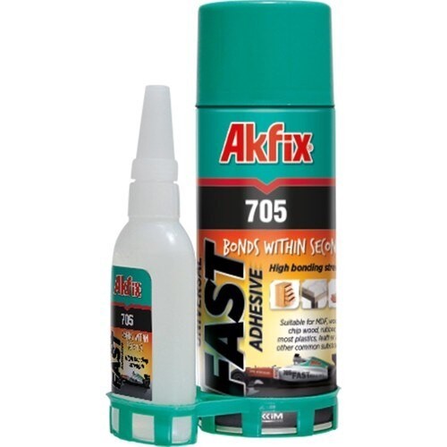 A container of construction adhesive or sealant, displayed against a white background.