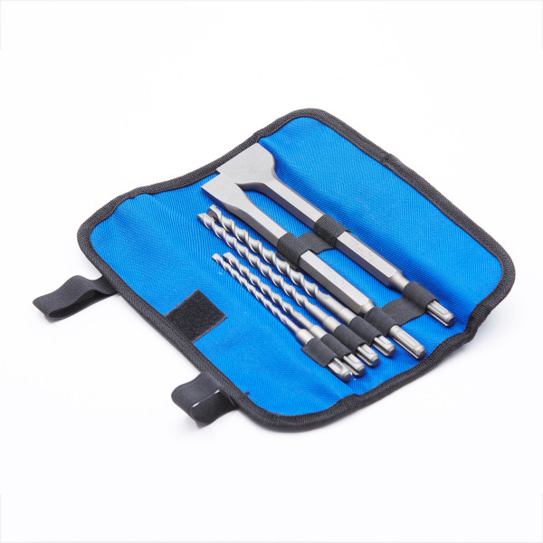 A blue fabric pouch holds a set of metal drill bits and a chisel, arranged neatly in individual elastic loops, with black trim and Velcro closures visible.