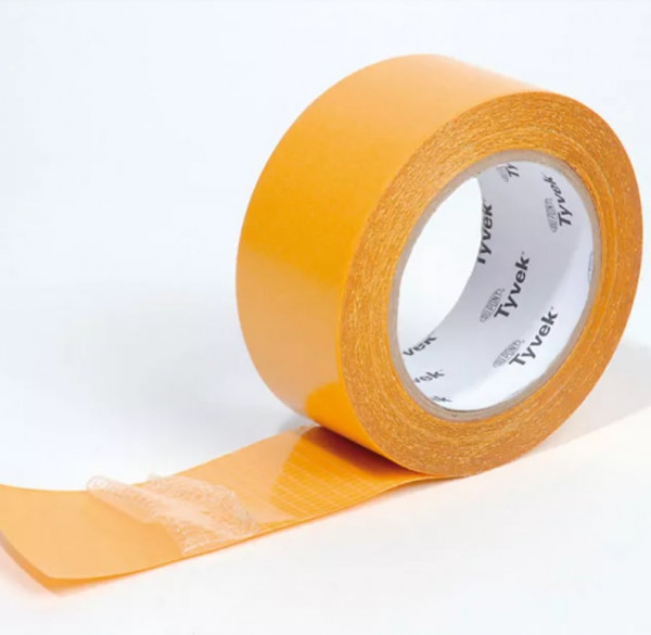 A roll of orange adhesive tape partially unspooled, showing a strip being pulled away. The inner label reads Tyvek and the tape has a glossy finish. The background is plain white.