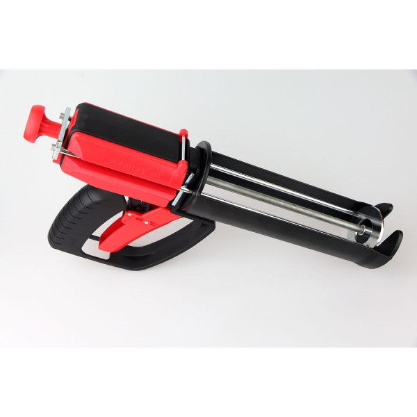 A red and black caulking gun with a curved handle and trigger, designed for dispensing sealant from tubes, is shown on a white background.