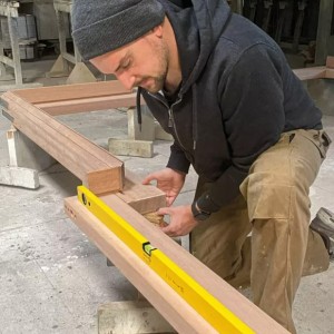 A Stabila 120cm spirit level with an extruded aluminium body and accurate vials, for checking horizontal and vertical alignment.