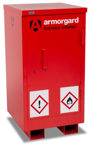 A red metal flammable storage cabinet labeled Armorgard flamstor cabinet with warning symbols for hazardous material and flammable contents on the front door.,