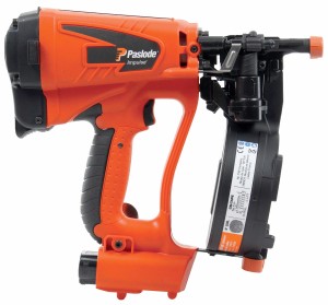 An orange and black Paslode cordless brad nailer with an angled magazine, designed for driving fine brad nails in trim and finish carpentry.